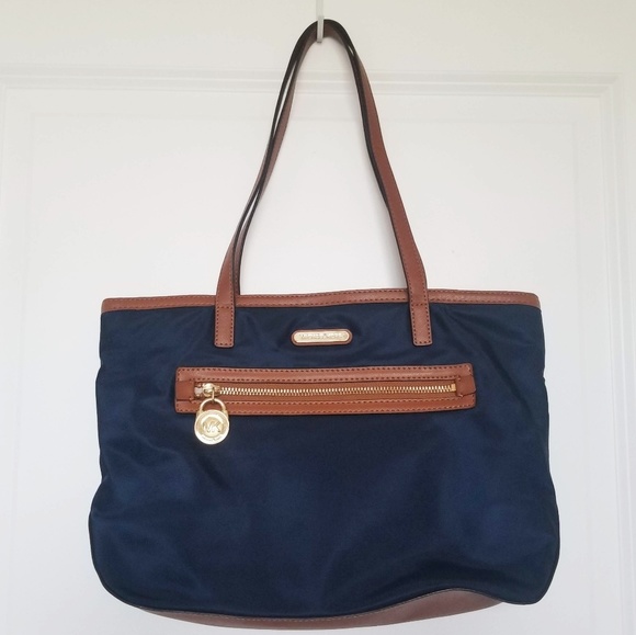 Michael Kors Handbags - Michael Kors | Navy Nylon Brown Leather Tote Bag